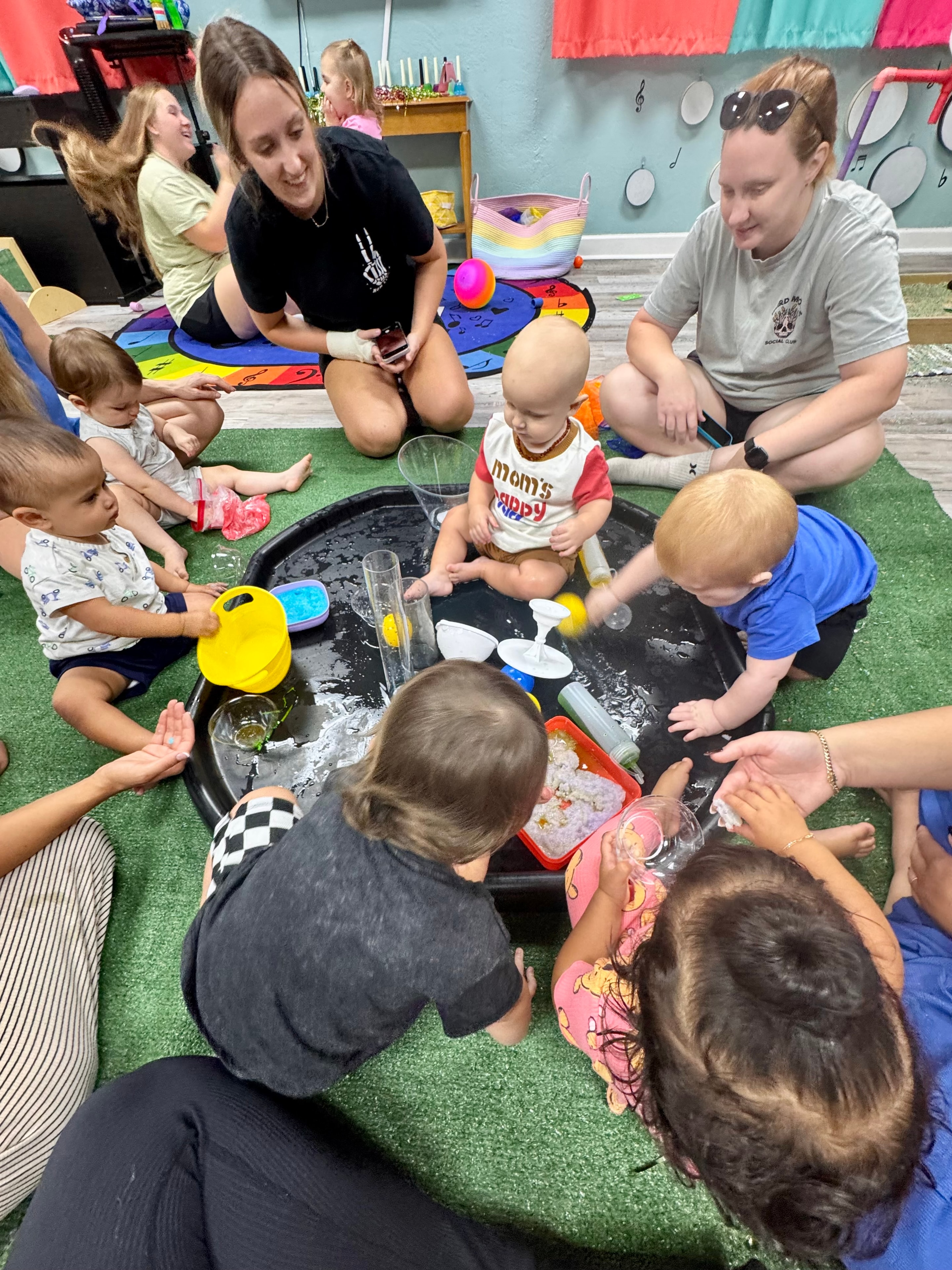 Children and caregivers playing together at a Sincerely Sensory class